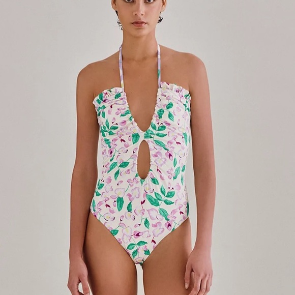 Palmacea, one piece, tied swimsuit with cut outs.  
Size M - Picture 12 of 12